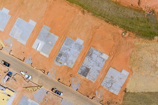 Foundation of house under construction site in preparation process with aerial top view