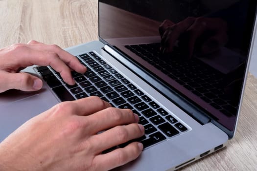 Midsection of caucasian businessman typing on keyboard, isolated on grey background. business technology, communication and growth concept digitally generated composite image.