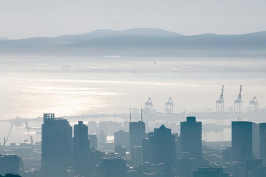 General view of cityscape with multiple modern buildings and scanes in the foggy morning. skyline and urban architecture.