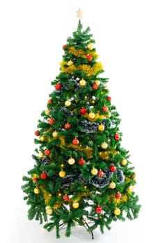 Composition of christmas tree with baubles and star decorations on white background. christmas, tradition and celebration concept.