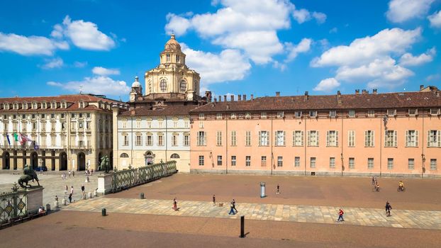TURIN, ITALY - CIRCA AUGUST 2020: perspective on the elegant and Baroque Saint Lawrence church in Turin. Amazing natural light with a blue sky.