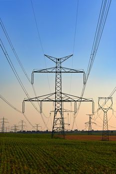 High voltage pylons. Concept for technology and industry. Rising energy prices - further rising electricity and energy prices - the energy crisis caused by the war between Russia and Ukraine.
