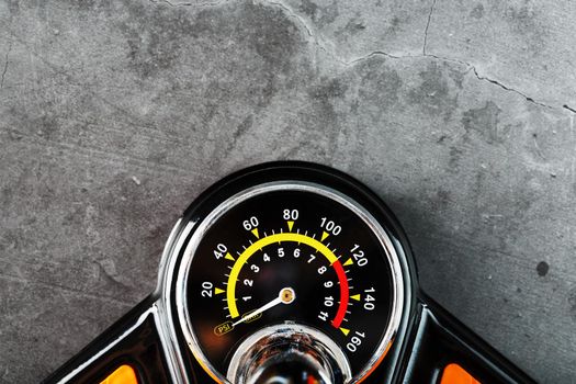 Hand air pump manometer for pressure control on a dark background close-up