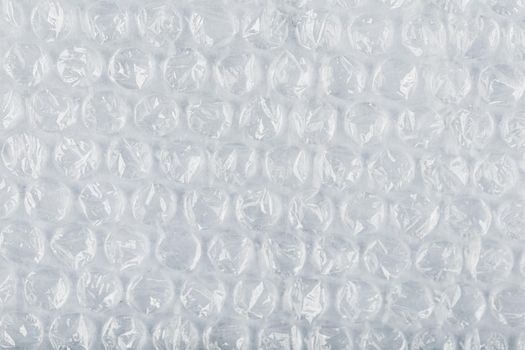 Packing bubble wrap for parcels on a White background in full screen