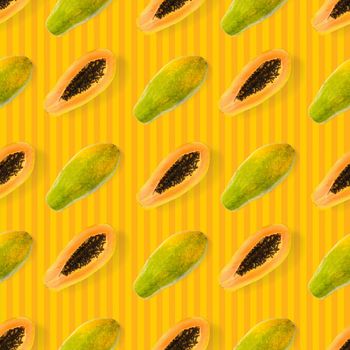 Fresh ripe papaya seamless pattern on orange background. Tropical abstract background. Top view. Creative design, minimal flat lay concept. Trend tropical fruit food background pattern