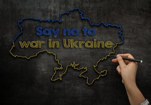 Say no to war in Ukraine text on a hand-drawn map. High quality photo