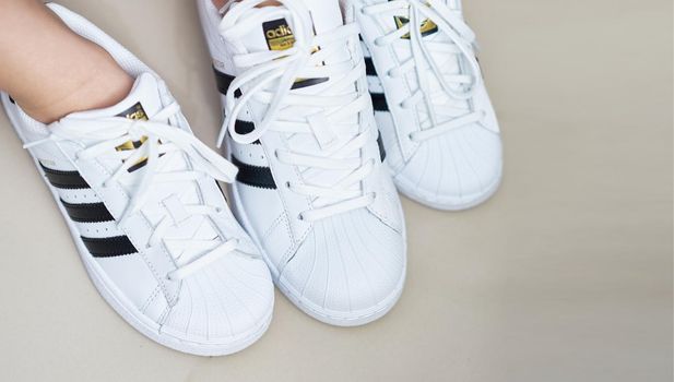 Bangkok ,Thailand,July 18 ,2018-Three white sneaker shoes brand Adidas