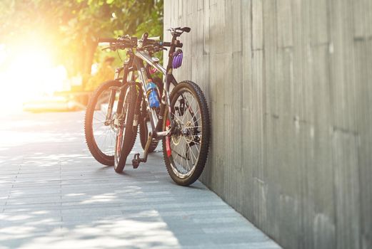 bicycles of cyclist travel parking with sun