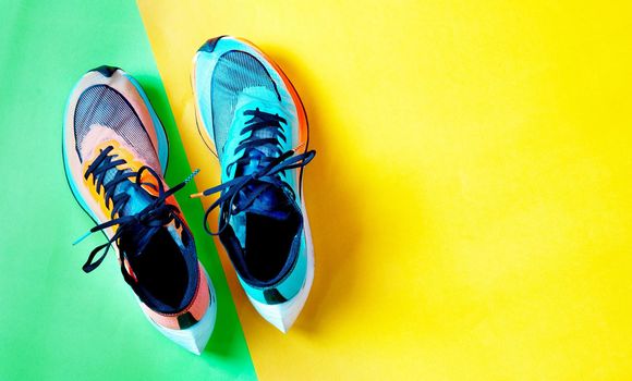 colorful running shoe on color background