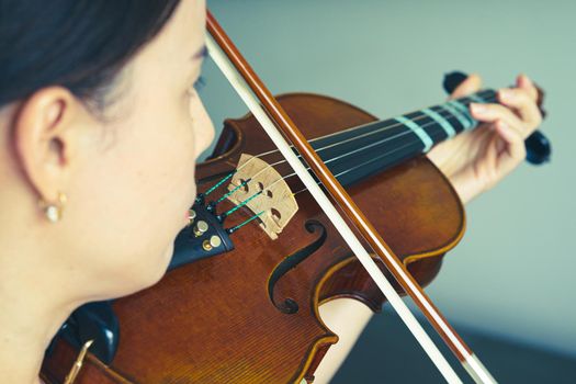 woman play violin in music like musician or violinist show string in portrait with sun