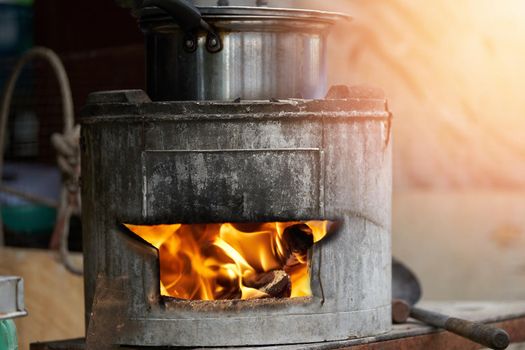 Old cooking pot stove using firewood