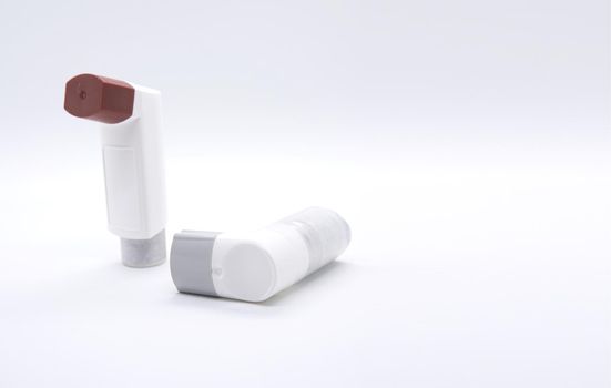 drug for asthma called medicine inhaler and for allergy treatment on white