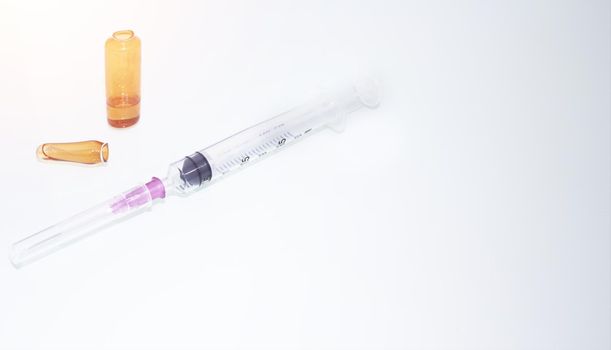 syringe ampule with copy space in medicine background concept