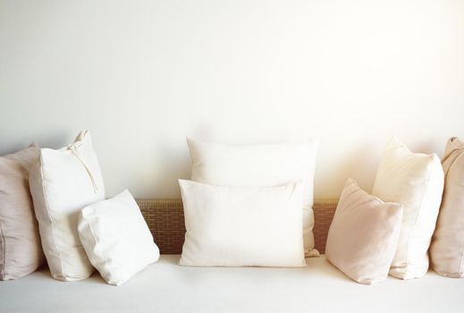 pillows on sofa with sun