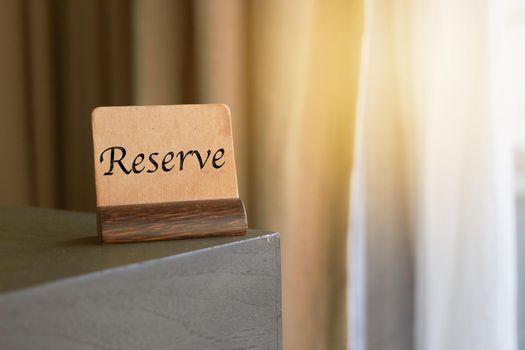 reservation sign on table with light