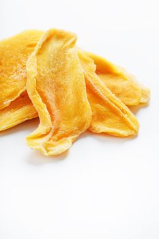 Orange Slices of Dried Sugar Mango Isolated on White Background