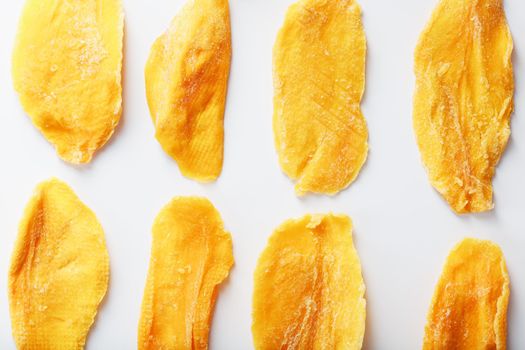 Orange Slices of Dried Sugar Mango Isolated on White Background