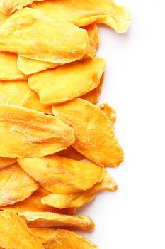 Orange Slices of Dried Sugar Mango Isolated on White Background