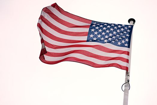 Shot of the flag of the United States of America blowing in the wind.