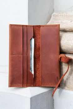 hand made leather wallet . Leather craft. Selective focus.