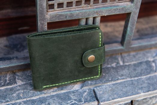 hand made leather wallet . Leather craft. Selective focus.