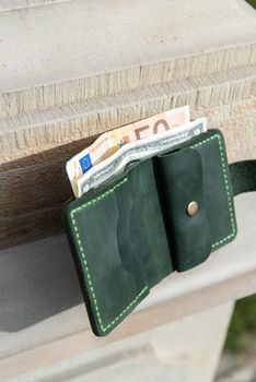 hand made leather wallet . Leather craft. Selective focus.