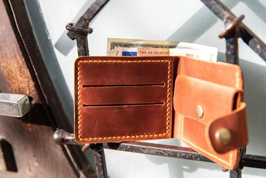 hand made leather wallet . Leather craft. Selective focus.