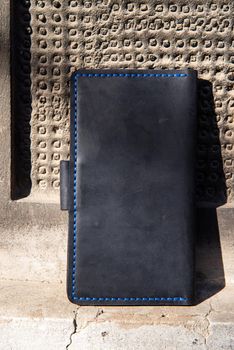 hand made leather wallet . Leather craft. Selective focus.