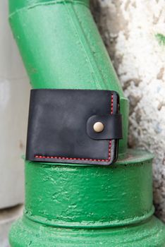 hand made leather wallet . Leather craft. Selective focus.