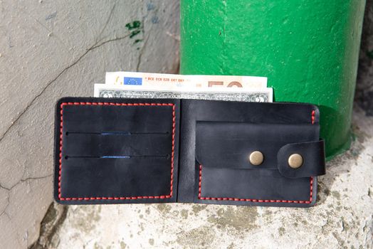 hand made leather wallet . Leather craft. Selective focus.