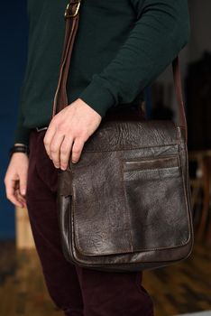 close-up photo of brown leather bag . indoor photo