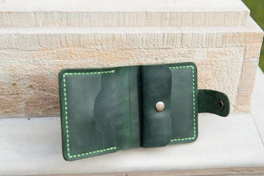 hand made leather wallet . Leather craft. Selective focus.