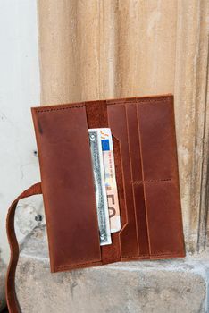 hand made leather wallet . Leather craft. Selective focus.