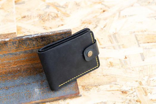 hand made leather wallet . Leather craft. Selective focus.