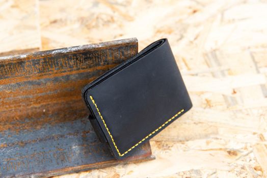 hand made leather wallet . Leather craft. Selective focus.