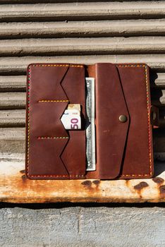 hand made leather wallet . Leather craft. Selective focus.