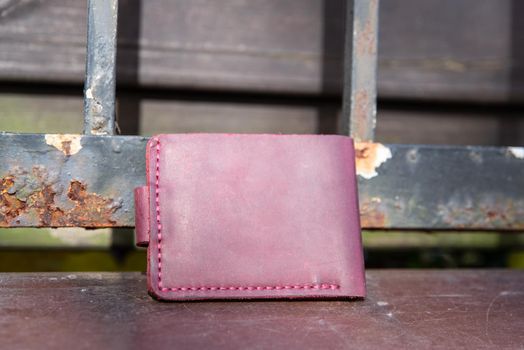 hand made leather wallet . Leather craft. Selective focus.