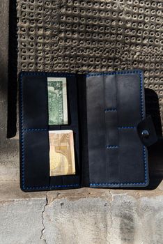 hand made leather wallet . Leather craft. Selective focus.