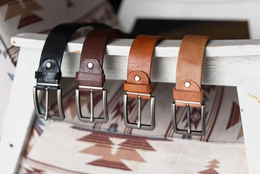 A set of colorful mens genuine sueded leather belts. fashion accessories.