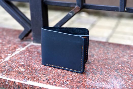 hand made leather wallet . Leather craft. Selective focus.