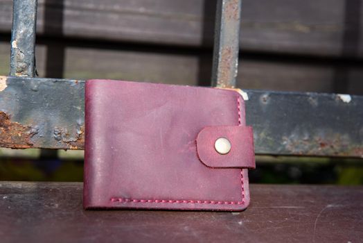 hand made leather wallet . Leather craft. Selective focus.