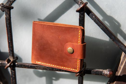 hand made leather wallet . Leather craft. Selective focus.