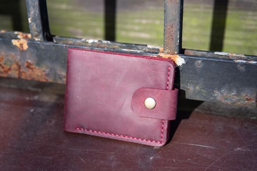 hand made leather wallet . Leather craft. Selective focus.