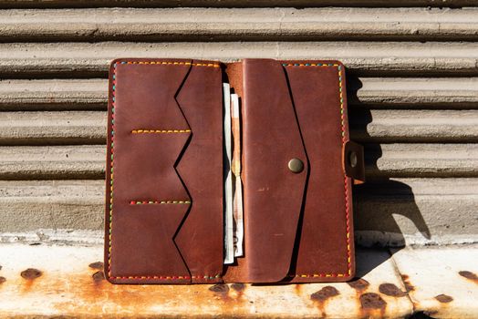 hand made leather wallet . Leather craft. Selective focus.