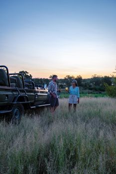 South Africa The Klaserie Private Nature Reserve February , luxury safari car during a game drive, couple men and woman on safari in South Africa.