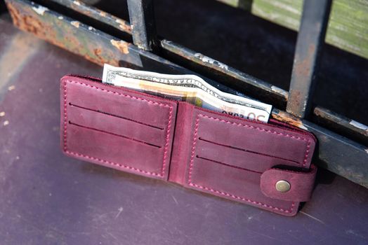 hand made leather wallet . Leather craft. Selective focus.