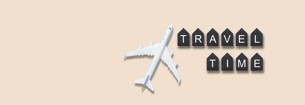 Airplane model. White plane on background. Travel vacation concept. Summer background. Flat lay, top view, copy space. High quality photo