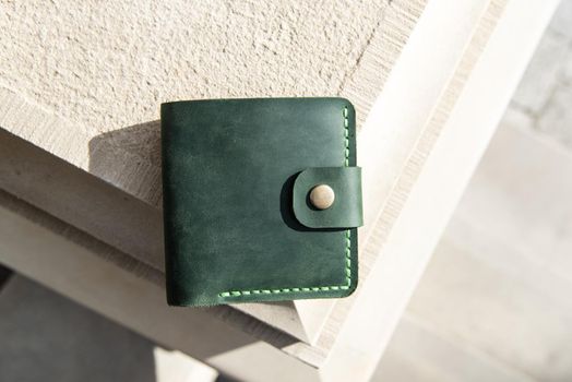 hand made leather wallet . Leather craft. Selective focus.