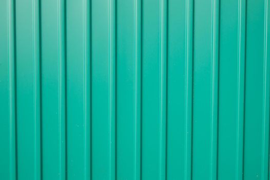 texture background green metal siding to finish the outside.