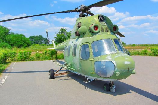 Mi-2 Hoplite. Helicopter standing on the site on a sunny summer day on image